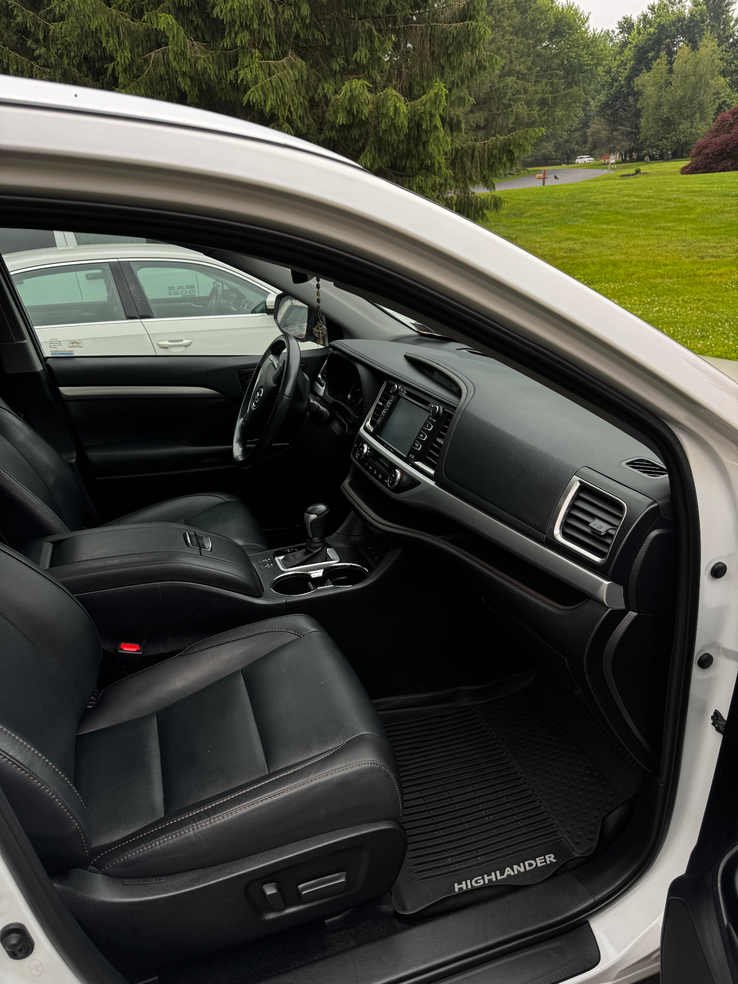 Spotless Toyota Highlander passenger-side interior